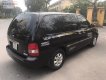 Kia Carnival 2.5 MT 2005 - Cần bán Kia Carnival 2.5 MT sản xuất 2005, màu đen, nhập khẩu, 225 triệu