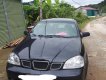 Daewoo Lacetti 2005 - Cần bán gấp Daewoo Lacetti sản xuất 2005, màu đen, 138tr