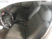 Mazda 323 2003 - Cần bán Mazda 323 đời 2003, màu bạc giá cạnh tranh