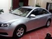 Chevrolet Cruze  LS  2011 - Chính chủ bán gấp Chevrolet Cruze LS năm sản xuất 2011, màu bạc 