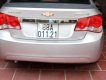 Chevrolet Cruze  LS  2011 - Chính chủ bán gấp Chevrolet Cruze LS năm sản xuất 2011, màu bạc 