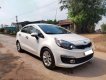 Kia Rio 2015 - Bán ô tô Kia Rio AT đời 2015, màu trắng, nhập khẩu nguyên chiếc xe gia đình