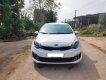 Kia Rio 2015 - Bán ô tô Kia Rio AT đời 2015, màu trắng, nhập khẩu nguyên chiếc xe gia đình