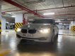 BMW 3 Series   2014 - Cần bán lại xe BMW 320i sản xuất 2014, màu trắng, xe nhập, giá 750tr