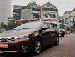 Toyota Corolla altis 1.8 2015 - Bán xe Toyota Corolla altis 1.8 đời 2015, màu nâu, số tự động, 595tr