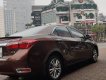 Toyota Corolla altis 1.8 2015 - Bán xe Toyota Corolla altis 1.8 đời 2015, màu nâu, số tự động, 595tr