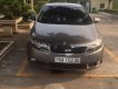 Kia Forte   2010 - Bán ô tô Kia Forte đời 2010, màu nâu