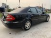 Mercedes-Benz E class   2003 - Bán xe Mercedes E class đời 2003, màu đen, 240 triệu