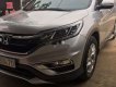 Honda CR V 2015 - Cần bán lại xe Honda CR V 2.0 AT sản xuất năm 2015, màu bạc số tự động, giá chỉ 655 triệu