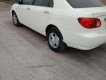 Toyota Corolla 2002 - Cần bán lại xe Toyota Corolla 1.3 sản xuất năm 2002, màu trắng xe gia đình