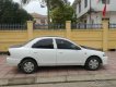 Mazda 323   2000 - Cần bán xe Mazda 323 năm 2000, hai màu trắng đen  