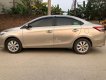 Toyota Vios 2017 - Cần bán Toyota Vios AT năm 2017, màu vàng số tự động