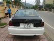 Mazda 323   2000 - Cần bán xe Mazda 323 năm 2000, hai màu trắng đen  