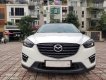 Mazda CX 5 2016 - Cần bán lại chiếc Mazda CX5 Signature Pre 2.5AT FWD, đời 2016, màu trắng, giá tốt