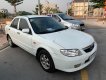 Mazda 323F 2004 - Cần bán gấp Mazda 323F GLX đời 2004, màu trắng