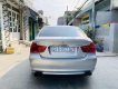 BMW 3 Series   2010 - Bán ô tô BMW 320i đời 2010, màu bạc, nhập khẩu