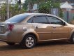 Daewoo Lacetti 2005 - Cần bán Daewoo Lacetti năm sản xuất 2005, màu vàng, xe nhập, 150tr