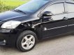 Toyota Vios 2009 - Cần bán xe Toyota Vios năm 2009, màu đen xe gia đình