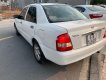 Mazda 323F 2004 - Cần bán gấp Mazda 323F GLX đời 2004, màu trắng