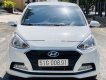Hyundai Grand i10   2017 - Bán lại xe Hyundai Grand i10 sản xuất năm 2017, màu trắng, số sàn