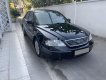 Ford Mondeo 2004 - Bán Ford Mondeo đời 2004, màu đen, 165tr