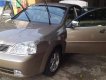 Daewoo Lacetti 2005 - Cần bán Daewoo Lacetti năm sản xuất 2005, màu vàng, xe nhập, 150tr