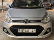 Hyundai Grand i10 2015 - Cần bán lại chiếc Hyundai Grand i10 AT hatchback sản xuất 2015, màu bạc, nhập khẩu nguyên chiếc