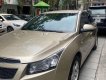 Chevrolet Cruze 2011 - Cần bán gấp Chevrolet Cruze MT đời 2012, màu vàng, nhập khẩu xe gia đình