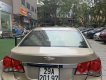 Chevrolet Cruze 2011 - Cần bán gấp Chevrolet Cruze MT đời 2012, màu vàng, nhập khẩu xe gia đình