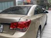 Chevrolet Cruze 2011 - Cần bán gấp Chevrolet Cruze MT đời 2012, màu vàng, nhập khẩu xe gia đình