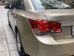 Chevrolet Cruze 2011 - Cần bán gấp Chevrolet Cruze MT đời 2012, màu vàng, nhập khẩu xe gia đình