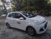 Hyundai Grand i10 MT 2014 - Bán ô tô Hyundai Grand i10 MT đời 2014, màu trắng, nhập khẩu xe gia đình