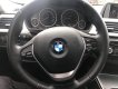 BMW 3 Series   2015 - Bán ô tô BMW 320i sản xuất 2015, màu đen, form 2016