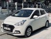 Hyundai Grand i10 2019 - Cần bán gấp Hyundai Grand i10 đời 2019, màu trắng đẹp như mới