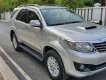 Toyota Fortuner 2014 - Cần bán gấp Toyota Fortuner MT năm 2014, màu bạc như mới