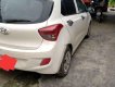 Hyundai Grand i10 2014 - Cần bán gấp Hyundai Grand i10 năm 2014, màu trắng, nhập khẩu, giá chỉ 217 triệu