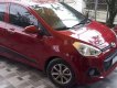 Hyundai Grand i10 2016 - Cần bán lại xe Hyundai Grand i10 năm 2016, màu đỏ, xe nhập giá cạnh tranh