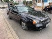 Daewoo Magnus 2004 - Cần bán Daewoo Magnus sản xuất 2004, màu đen, 139tr