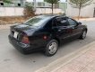 Daewoo Magnus 2004 - Cần bán Daewoo Magnus sản xuất 2004, màu đen, 139tr