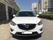 Mazda CX 5 2015 - Gia đình cần bán Mazda CX5 model 2015, màu trắng. Xe gia đình đi kĩ