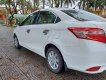 Toyota Vios 2014 - Gia đình cần bán Toyota Vios sản xuất 2014, màu trắng, mới đi được 10.000km