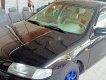 Mazda 323 2000 - Bán Mazda 323 sản xuất năm 2000, màu đen, giá chỉ 86 triệu