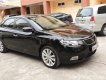 Kia Cerato 2011 - Cần bán lại xe Kia Cerato 1.6 AT đời 2011, màu đen, xe nhập