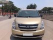 Hyundai Starex 2012 - Cần bán gấp Hyundai Starex MT năm sản xuất 2012, màu vàng số sàn, giá 453tr