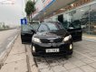 Kia Sorento   2014 - Bán xe cũ Kia Sorento GAT 2.4L 2WD đời 2014, màu đen