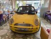 Mini Cooper 2006 - Cần bán lại xe Mini Cooper AT đời 2006, màu vàng, nhập khẩu