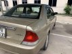 Ford Laser 2001 - Bán xe Ford Laser sản xuất năm 2001, màu vàng xe gia đình