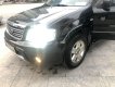 Ford Escape 2005 - Cần bán Ford Escape 2.3L AT năm 2005, màu đen số tự động