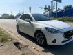 Mazda 2 2015 - Cần bán gấp Mazda 2 đời 2015, màu trắng, xe nhập chính chủ