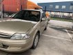 Ford Laser 2001 - Bán xe Ford Laser sản xuất năm 2001, màu vàng xe gia đình